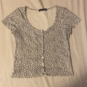 Brandy Melville white with black flowers crop top
